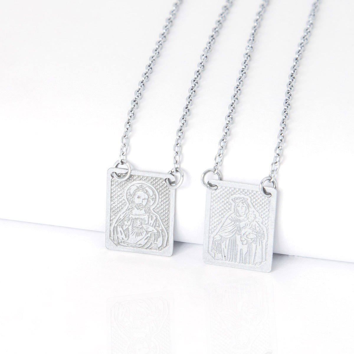 Escapulário Sagrado Coração de Jesus e Nossa S. do Carmo em Aço Inox