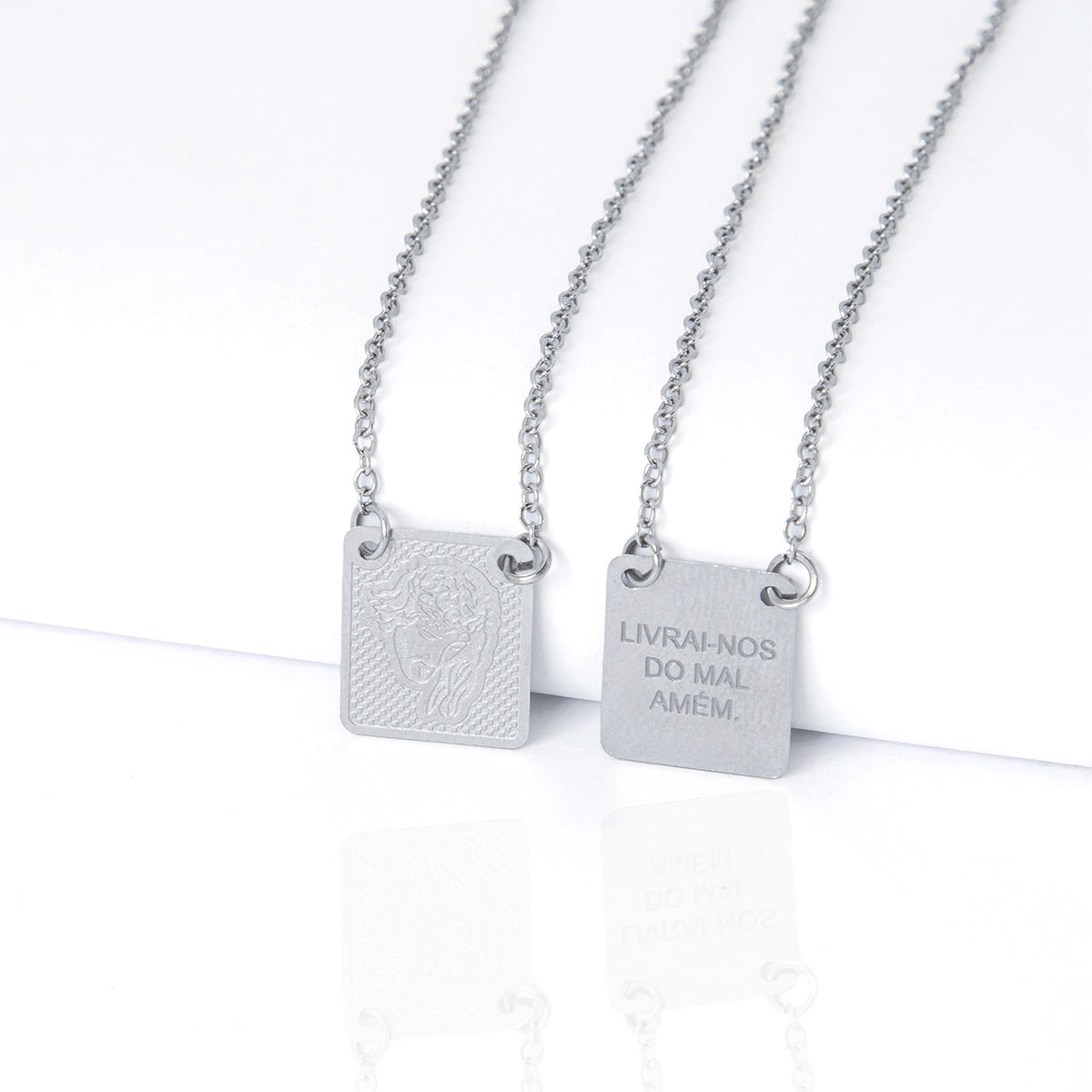 Escapulário Jesus Cristo Livrai-Nos do Mal Amém  Aço Inox