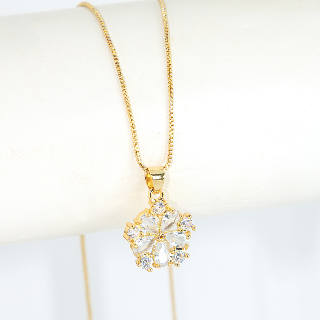 Conjunto Flor de Luz Cravejado Banhado